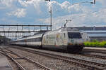 Re 460 041-7 mit der COOP Werbung durchfährt den Bahnhof Rupperswil.