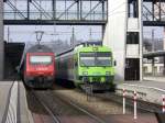 Re 460 026 und ein 932 der BLS in Spiez am 03.11.2007