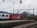 Die SBB Re 460 StratgeGo bei der Ausfahrt mit einem IC CHur-Zrich HB-Basel in Landquart.