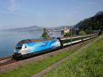 Die Re 460 024 (Zugkraft Aargau) mit einem IR am 29.06.2009 unterwegs bei Veytaux-Chillon.