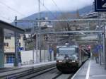 Re 460 118-3  Alptransit  mit einem IC nach Brig bei der durchfahrt im Bhf Leuk-Susten.