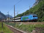 Die Re 460 071 mit einem IR nach Locarno am 26.06.2011 bei der Ausfahrt aus Erstfeld.