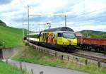 Re 460 053 mit einem IC am 03.09.2009 unterwegs bei Faulensee.