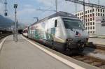 Werbung fr die  Flachbahn durch die Alpen  Re 460 107-6 vor einem Zug nach Basel in Chur.01.09.13