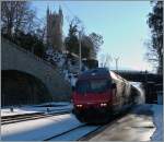 Pulverschnee in Vevey ist weitaus seltener, als der hier zu sehende IR mit der SBB Re 460 071-4.