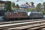 Re 4/4 181 (425 181-5)  Interlaken  und Re 465 015-6  La Vue-des-Alpes  der BLS Cargo AG (BLSC) sind im Bahnhof Spiez (CH) abgestellt.