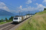 Re 465 016 mit einem Containerzug am 24.06.2016 bei Einigen.