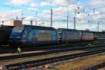 Am 11.02.2013 stand bei schönem Sonnenschein die BLS Cargo Loks Re 465 008-1  GoldenPassLine  zusammen mit ihren Schwestern 465 014-9 und der Re 465 013-1  Stockhorn  in Basel Bad Bf und warten