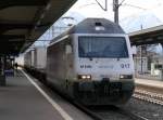 BLS / RailCare  - Lok 465 017-2 mit Güterzug bei der durchfahrt im Bahnhof Giubiasco am 27.02.2015