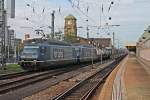 Durchfahrt am 25.10.2014 über Gleis 2 von Re 465 010-7  Mont Vully  zusammen mit Re 465 014-9  Spalenberg  und einem Containerzug in Basel Bad Bf gen Rangierbahnhof Muttenz.