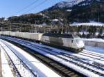 Railcare / BLS - Lok 465 016-4 mit Güterzug im Bahnhofsareal in Airolo am 10.03.2016