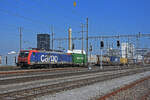 Re 474 003-1 durchfährt den Bahnhof Pratteln. Die Aufnahme stammt vom 23.03.2022.