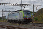 Siemens Vectron 475 404-0 der BLS durchfährt solo den Bahnhof Pratteln.