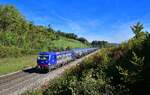 Re 475 902 mit einem Kesselzug am 05.10.2022 bei Schinznach Dorf.