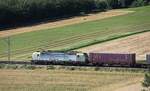 Eine Vectron von BLS Cargo zieht am 06.07.2020 einen Containerzug bei Sissach BL Richtung Basel.