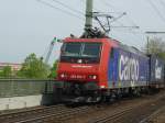 482 024-7 der sbb-cargo vor einem Containerzug. Aufgenommen am 21.4.2007 auf der Sdbrcke in Kln.