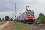 Mit dem DGS 49069 (Ludwigshafen BASF Ubf - Muttenz) fuhr am 16.09.2016 die Re 482 021-3 zusammen mit der Re 482 008-0  Ökotrans  bei Müllheim (Baden) in Richtung Zielbahnhof.