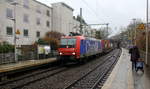 482 011-4 von ChemOil kommt aus Richtung Köln,Aachen-Hbf und fährt durch Aachen-Schanz mit einem Containerzug aus Gallarate(I) nach Antwerpen-Oorderen(B) und fährt in Richtung