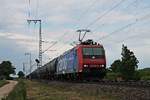 Mit einem  Kerosin -Kesselzug nach Glattburg (CH) fuhr am 22.05.2018 die Re 482 023-9 nördlich von Müllheim (Baden) über die KBS 703 in Richtung Schweiz.