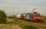 482 017 der SBB Cargo schleppte am Abend des 23.09.19 einen Silo- und Kesselwagenzug durch Gräfenhainichen Richtung Bitterfeld.