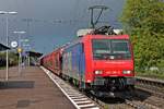 Durchfahrt am Nachmittag des 28.04.2019 von Re 482 001-5 mit dem  Hyundai -Autoganzzug aus Rotterdam durch den Bahnhof von Müllheim (Baden) in Richtung Basel.