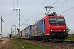 Mit einem langen und bunten KLV aus Belgien fuhr am Nachmittag des 07.05.2019 die Re 482 027-0 nördlich von Müllheim (Baden) über die KBS 703 durchs Rheintal in Richtung Schweizer