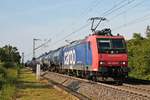 Mit einem vollen  Kerosin -Kesselzug nach Glattbrugg (CH) fuhr am Nachmittag des 24.05.2019 die Re 482 029-6 südlich vom Haltepunkt Buggingen über die Rheintalbahn durchs