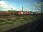 Eine HGK Lok nebe 2 SBB Cargo Loks der reich Re 482 in Ingolstadt am 23.06.2007