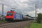 Am Nachmittag des 12.08.2019 fuhr SBBC/WRS Re 482 047-9 mit einem leeren Kesselzug beim Haltepunkt von Auggen über die KBS 702 durchs Rheintal gen Norden.