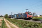 Mit einem langen KLV nach Italien fuhr am Nachmittag des 22.04.2020 die Re 482 015-5  ChemOil  bei Buggingen über die KBS 702 durchs Markgräflerland in Richtung Müllheim (Baden).