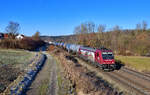 Re 482 047 mit einem Kesselzug am 19.01.2022 bei Seestetten.