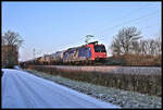 SBB 482012-2 ist hier am 19.01.2024 um 9.19 Uhr mit einem Kesselwagenzug auf der Rollbahn in Hasbergen in Richtung Osnabrück unterwegs.