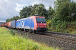 482 028-8 mit einem Containerzug am 12.09.2024 bei Kerzell.