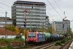 482 018-9 SBB Cargo  Alpäzähmer.  mit Kesselzug in Düsseldorf Rath, November 2023.