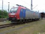 482 034-6 der SBB Cargo Kln mit Zusatzbeschriftung der TXlogsitik an die sie verliehen ist steht im Betriebsbahnhof Burchardkai.
Juni 2004