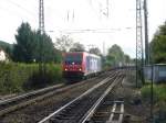 482 035-2 der SBB Cargo zieht ihren Containerzug am frhen Abend des 30.09.07 durch den kleinen Bahnhof Gundelfingen im Breisgau nach Norden.