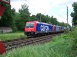 Baureihe 482 036-1 zieht zwei weitere Loks der SBB Cargo (eine weitere 482 und eine 421) sowie einige Kesselwagen am 28.05.2009 bei Tekenberg zwischen Magdeburg und Braunschweig.