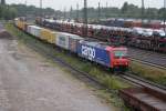 482 021-3 bei der Einfahrt in den Seelzer Rbf.an eienm nass/kaltem 10.07.2009