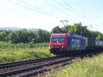 Re 482 009-8 (ex Holcim) befindet sich hier zwischen Gundelfingen und Denzlingen am 10.06.2006