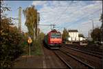 482 023 durchfhrt mit einem KLV-Zug den Bahnhof Bonn-Beuel.