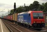 Re 482 042-9 poltert mit ihrem Containerzug durch Hamburg-Harburg Richtung Hafen. Aufgenommen am 28.08.10.