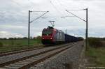 482 034-6 SBB Cargo die fr TX Logistik AG fhrt mit Eanos Ganzzug von der ERR GmbH, zwischen Brandenburg und Gtz in Richtung Brandenburg unterwegs.