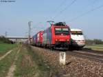 25.03.2011: Die 482 007-2 mit einem Containerzug Richtung Sden trifft auf 401 078  Bremerhaven . Aufgenommen bei Graben-Neudorf.