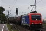 SBB Cargo 482 047 am 9.8.11 mit einem Kesselwagenzug bei der Durchfahrt durch Duisburg-Bissingheim.