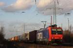 SBB Cargo 482 016 am 10.12.11 mit einem Containerzug bei der Durchfahrt durch Ratingen-Lintorf.