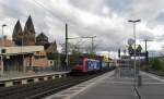 SBB Cargo 428 028-8 mit einem KLV Richtung Kln, am 24.04.2012 neben der Herz Jesu Kirche in Koblenz Stadtmitte.