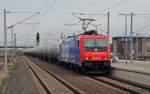 482 037 der SBB Cargo fuhr am 10.04.12 mit einem Kesselwagenzug durch Bitterfeld Richtung Halle(S).