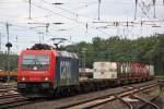 SBB Cargo 482 047 (im Einsatz fr RTB Cargo) am 9.6.12 mit einem Containerzug in Duisburg-Entenfang.