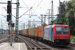 SBB Cargo 482 049 am 31.7.12 mit einem Containerzug in Hamburg-Harburg.