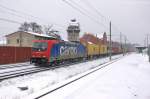 482 046-0 SBB Cargo fr HSL Logistik GmbH mit einem Containerzug in Rathenow.